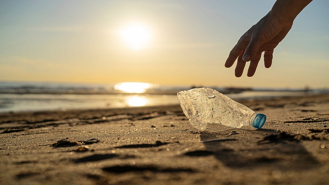 water bottle on beach